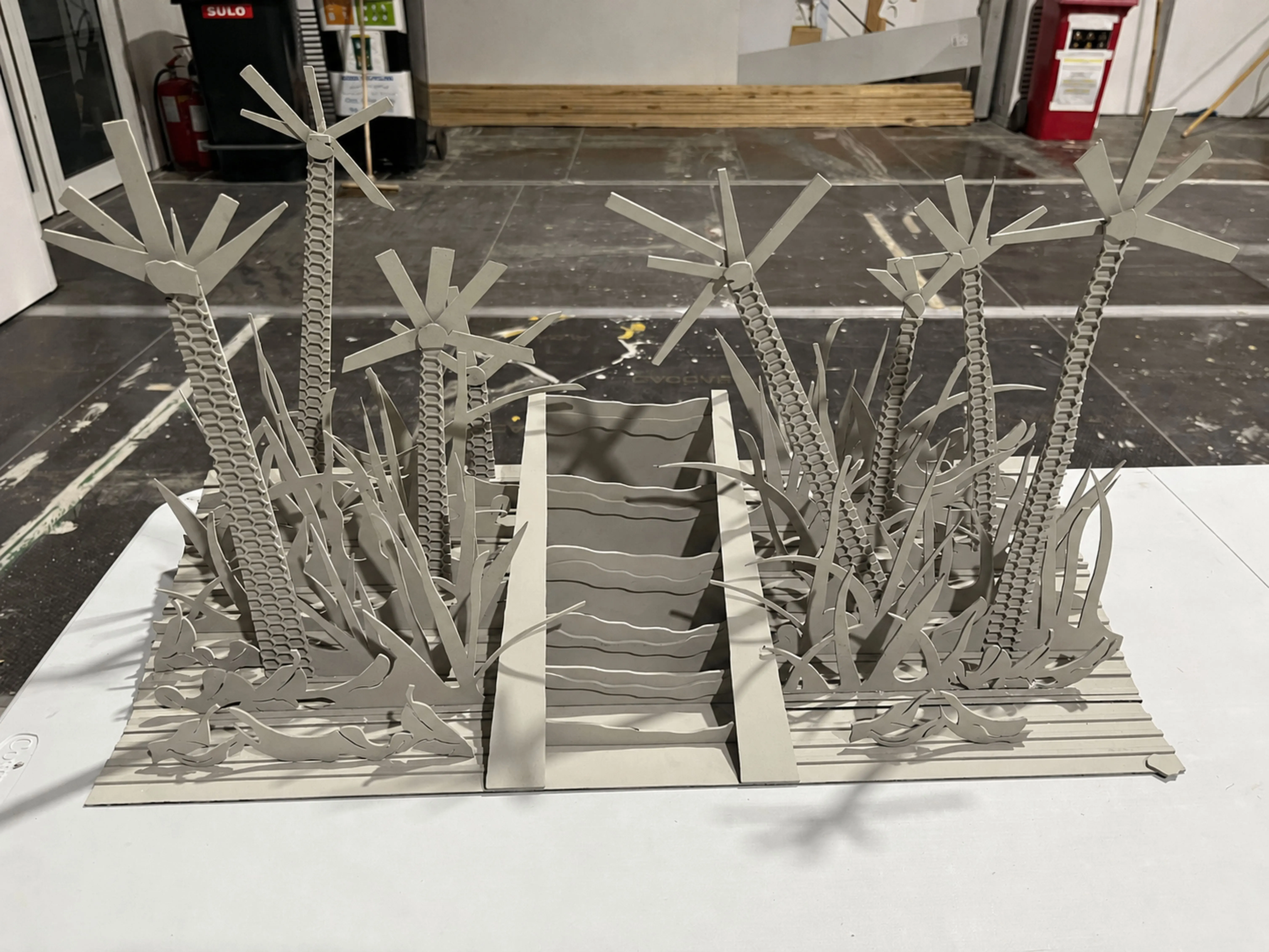 Assembled Union Day diorama with grey-board palm trees, grasses and a central walkway
